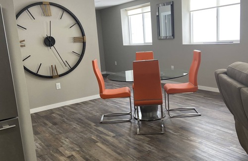 Wisconsin Rapids Apartment | Contemporary 1400 sq ft space in lower level Open concept gas burning fireplace