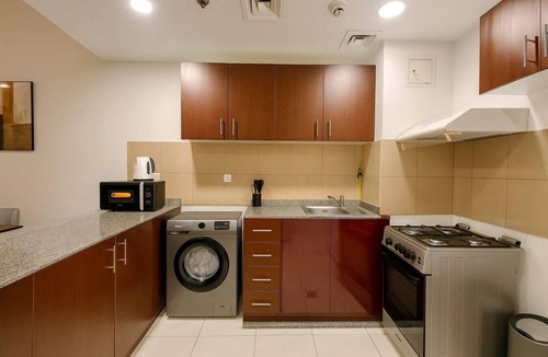 Jumeirah Village Circle Apartment | Convenient Location in JVC Bright 1BR with Balcony