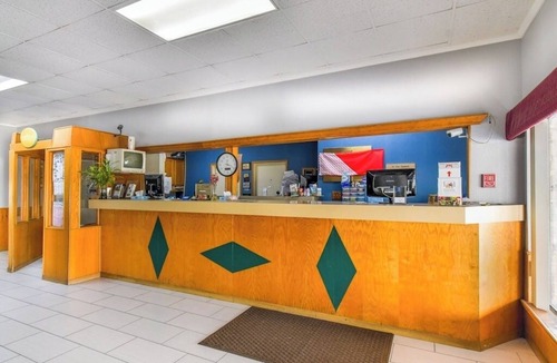 Tyler Hotel | Convenient Room with Work Desk Ideal for Business Travelers