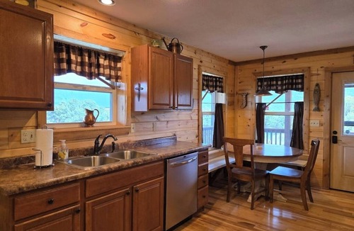 Alpine Village Cabin | Conveniently located cabin with full kitchen, w/d, large deck & great views