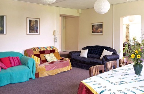 Winslow Cabin | Converted stable block cottage with function room, courtyard garden & woodland