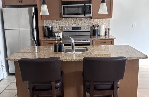 Copperstone Resort Condo | Copper Point - Outdoor Hot Tub | Fire Table | Gym
