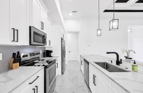 Diplomat House | Coral Waters Modern Escape | Pool Home