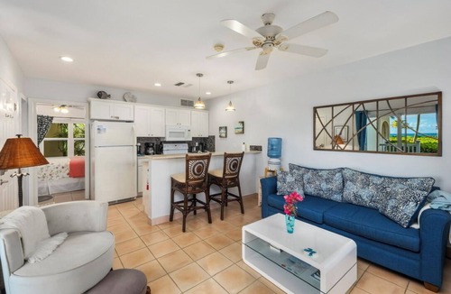 Wheeland Settlement Condo | Corner Ground Floor Oceanfront/Stunning Ocean Views & Easy Beach Access.