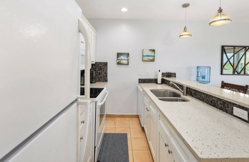 Wheeland Settlement Condo | Corner Ground Floor Oceanfront/Stunning Ocean Views & Easy Beach Access.