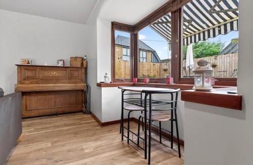 Bearsden House | Corner View - Welcoming family home with conservatory