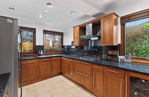 Bearsden House | Corner View - Welcoming family home with conservatory