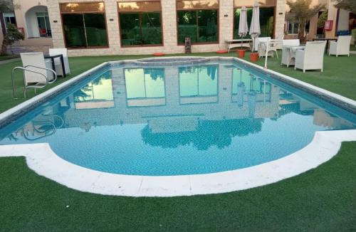 Rumailah Hotel | Corniche Palace Hotel