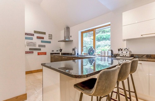 The Braes Cottage | Corrie Burn Villa is located on Braes of Ullapool with spectacular sea views.