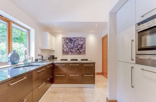 The Braes Cottage | Corrie Burn Villa is located on Braes of Ullapool with spectacular sea views.
