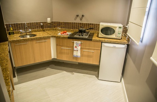 Gonzaga Apartment | Cosmopolitan Praia Flat
