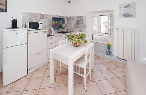 Germignaga Apartment | Cosy apartment for 3 guests with WIFI, TV and patio