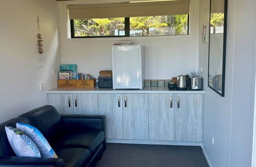 Moetapu Bay Cabin | Cosy modern two bedroom off-grid cabin, in the Marlborough Sounds
