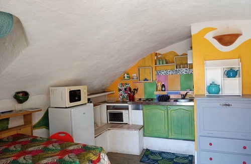 Yzeron Apartment | Cosy, vaulted studio with terrace