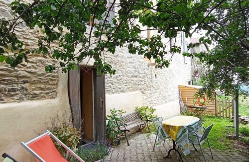 Yzeron Apartment | Cosy, vaulted studio with terrace