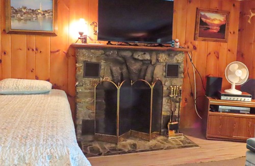 Meredith Cottage | Cottage with beach access, a fireplace, yard, grill, cable & golf nearby
