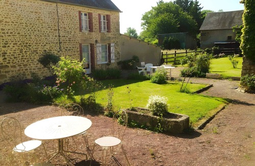 Sainte-Scolasse-sur-Sarthe House | Country House with Private Terrace, Garden, and Wi-Fi in Sainte-Scolasse-sur-Sarthe