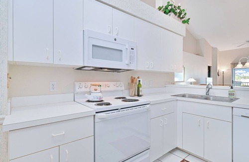Estero Condo | Country Creek - Charming and Light Corner Condo with Golf !