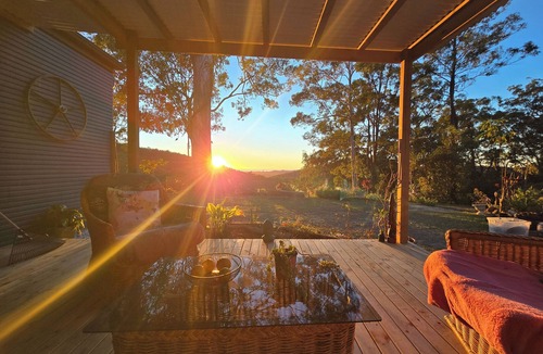 Bonogin Cottage | Couple's retreat, ocean views on the horizon. Cosy fully equipped accommodation.