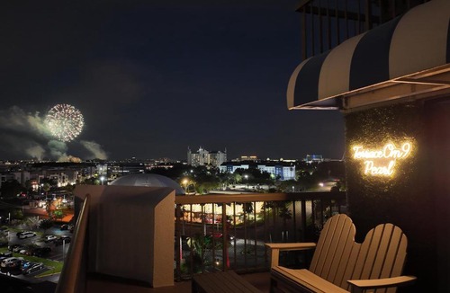 Southwest Orlando Apartment | Couples Getaway with Private Terrace and Fireworks View