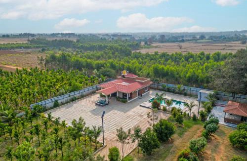 Doddaballapur Villa | Courtyard Banyan Rustic 2 BHK villa with pool banyan gazebo and open courtyard living