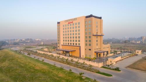 Bhatpore Hotel | Courtyard by Marriott Surat