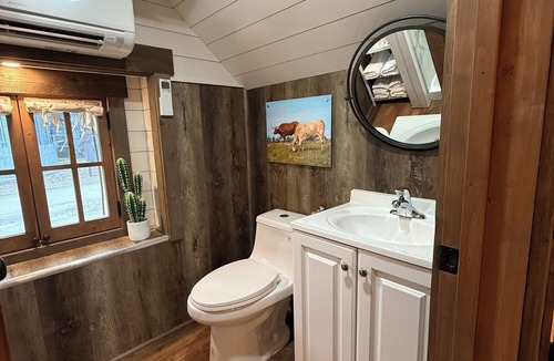 Pinnacles Entrance Badlands Hotel | Covered Glamping Wagons: Step Into the Frontier With Modern Comforts