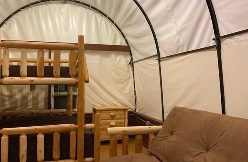 Manchester Cabin | Covered Wagon - Feel the thrill of Glamping at it's best!