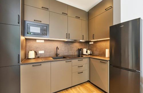 Munchen District Apartment | COZEE - Moderne Design-Apartments I Parkplatz I Ideal für München & Flughafen MUC