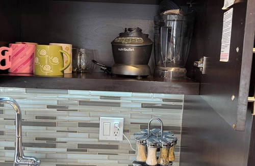 Vernon Apartment | Cozy 2-bedroom corner unit skyrise apartment with city views