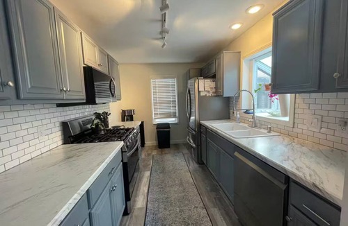 Midland House | Cozy 4 Bed 2 Bath Home, Private Patio