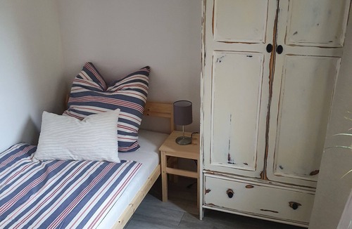 Wustermark Apartment | Cozy apartment on a three-sided farm