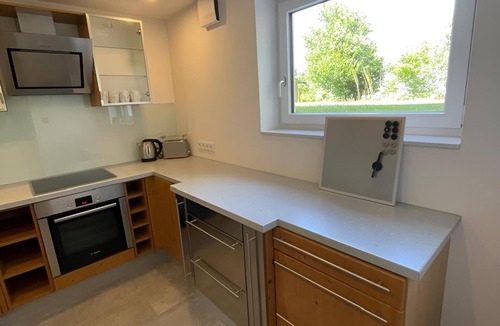 Wernberg-Koeblitz Apartment | Cozy basement apartment with spacious living room and green outdoor area