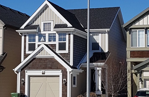 Southeast Calgary House | Cozy basement unit near restaurants, bars, stores, bus stations, and hospital.