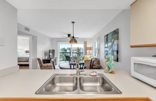 Butler Beach Condo | Cozy Beach Corner Cozy