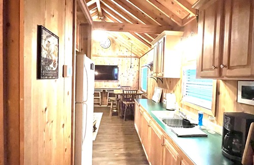 Dillard Cabin | Cozy Cabin in River Vista Mountain Village RV/Cabin Park + Amenities
