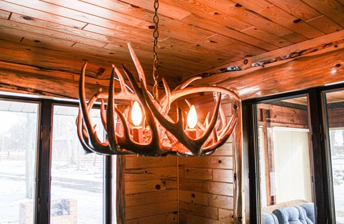 Au Gres Cabin | Cozy Cabin in the Woods- close access, private road to dock & Lake Huron access.