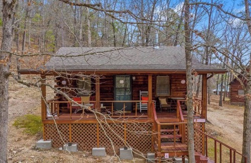 Eureka Springs Cabin | Cozy cool nights by the fire, warm your soul in the hot tub! Cozy love nest!