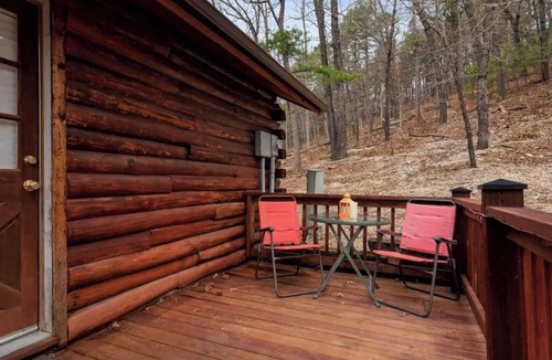 Eureka Springs Cabin | Cozy cool nights by the fire, warm your soul in the hot tub! Cozy love nest!