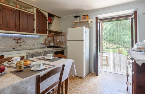 Piazza al Serchio House | Cozy cottage with fireplace and stunning views.
