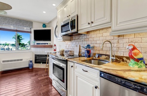 Naples Resort | Cozy Designer Studio with Water views of Marina in Port of The Islands Naples!