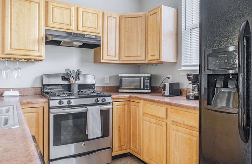 Fall Creek Place House | Cozy Downtown Escape! Hot tub and Modern Touches