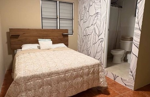 Rio Grande House | Cozy Jayuya Apartment with City, Garden, and Mountain Views