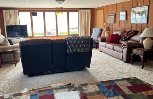 Shawano Cottage | Cozy lakefront home rests on Shawano Lake - swimming, fishing, boating, dock.