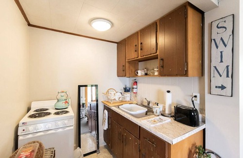 Standish Condo | Cozy Lakeside Studio w/Private Swimming Area
