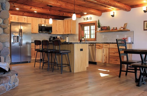 Manitowish Waters Cabin | Cozy Lakeside Log Cabin with fireplaces/Central AC on Manitowish Waters Chain.