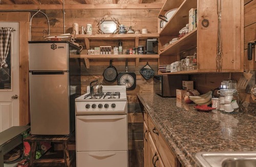 Leicester Cabin | Cozy Log Cabin with an Indoor Fireplace Located on 70 Forested Acres in Leicester, Vermont