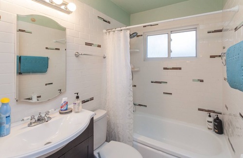 Redding House | Cozy mid century house with pool, hot tub, Dish Tv, WiFi, fireplace, waterfall
