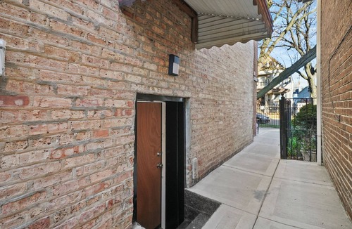 Irving Park Apartment | Cozy, Modern Garden Unit