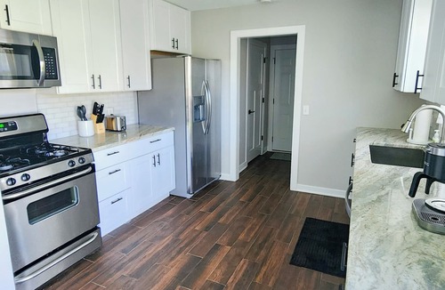 Saylorville House | Cozy, modern stay perfect for families. Fully fenced and private back yard.